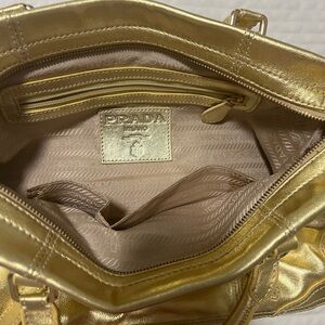 gold authentic prada bag